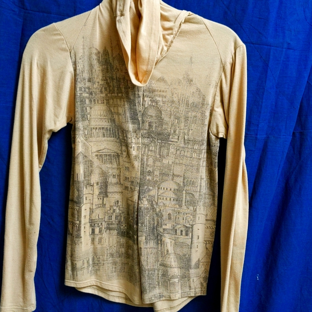 Cityscape tan turtleneck by Jared Gold